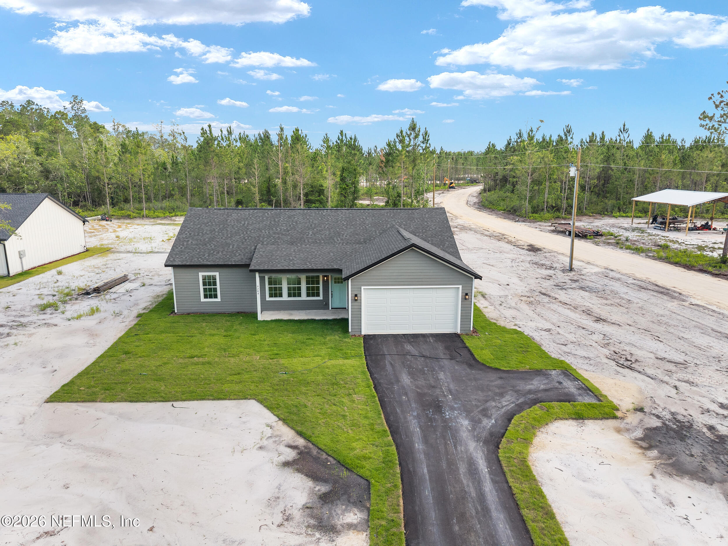 9284 Southwest Sw Cr Hampton, FL 32044 - Photo 37 of 48 DJI_20260625184245_0343_D