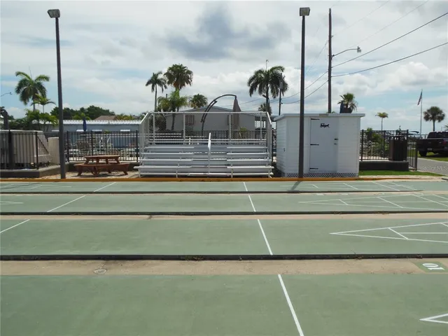 a hallway with a washer and dryer