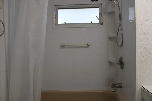 a view of houses with swimming pool outdoor seating