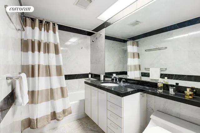 a kitchen with a sink and refrigerator