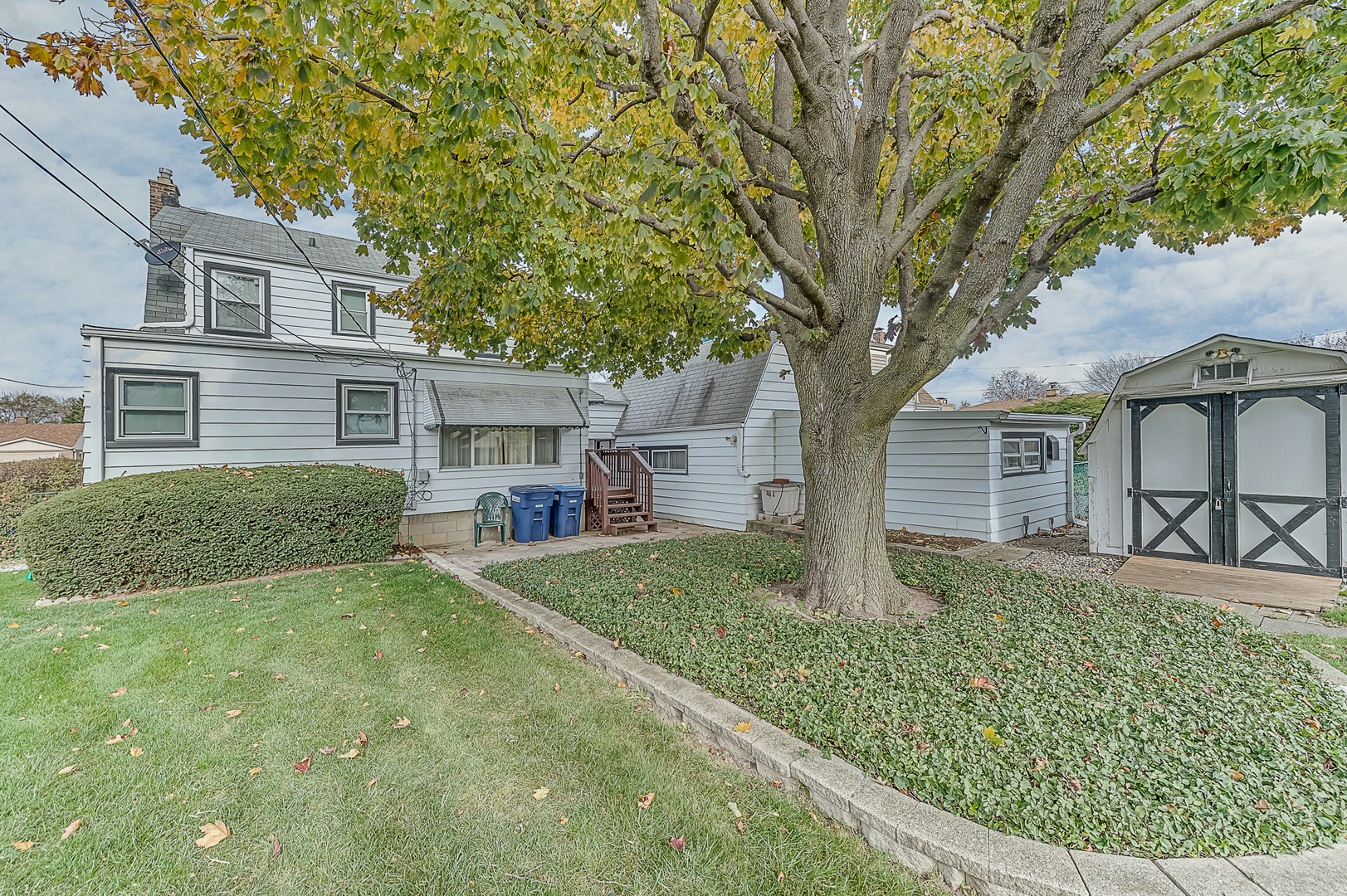 159 Parkview Drive Northlake, IL 60164 - Photo 24 of 24 a front view of a house with garden