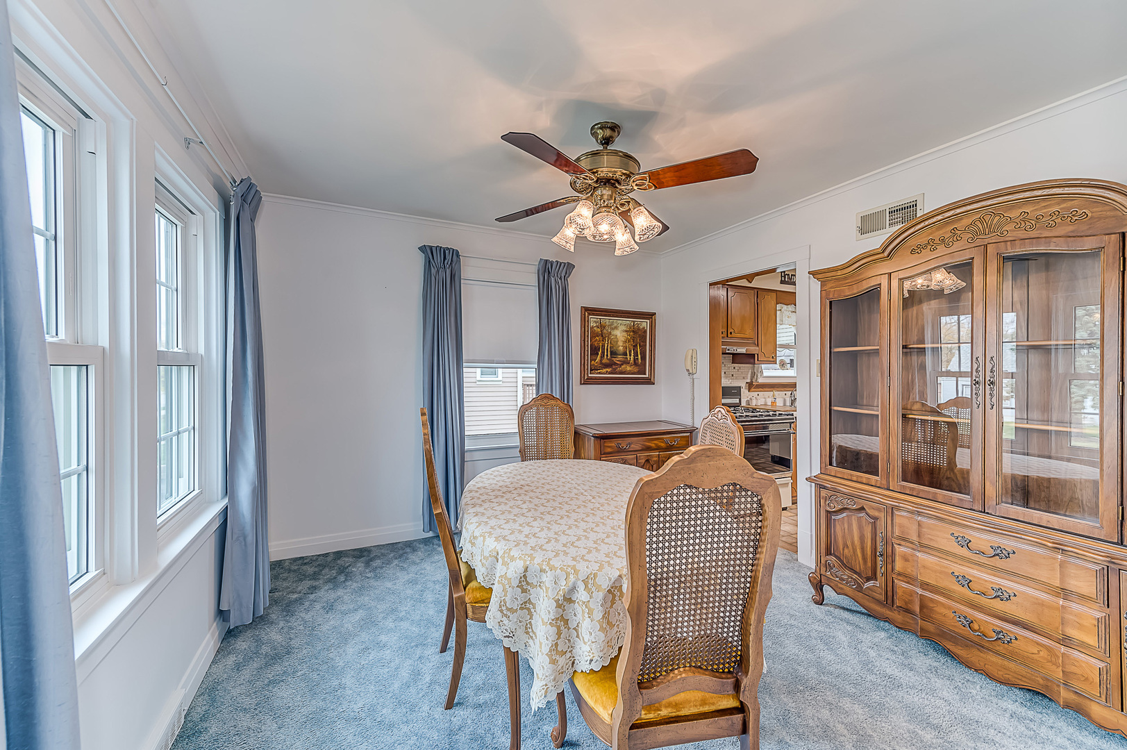 159 Parkview Drive Northlake, IL 60164 - Photo 7 of 24 a view of a dining room with furniture and a chandelier