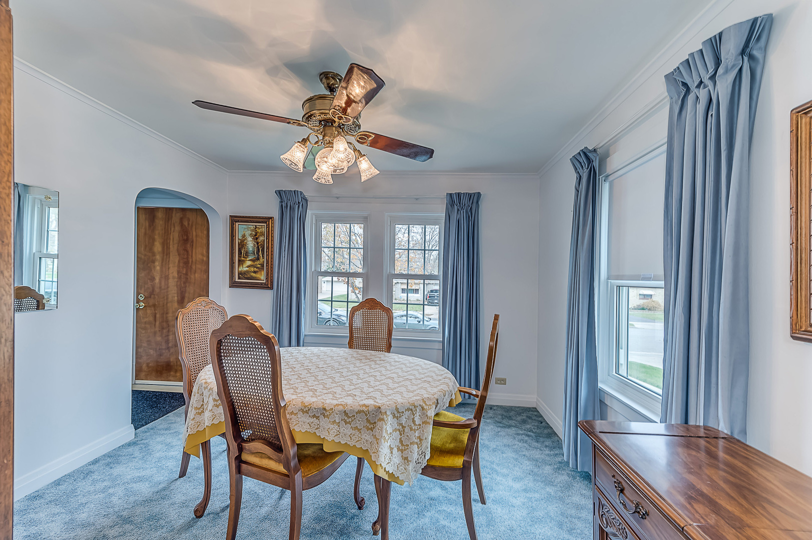159 Parkview Drive Northlake, IL 60164 - Photo 8 of 24 a dining room with furniture a chandelier and wooden floor