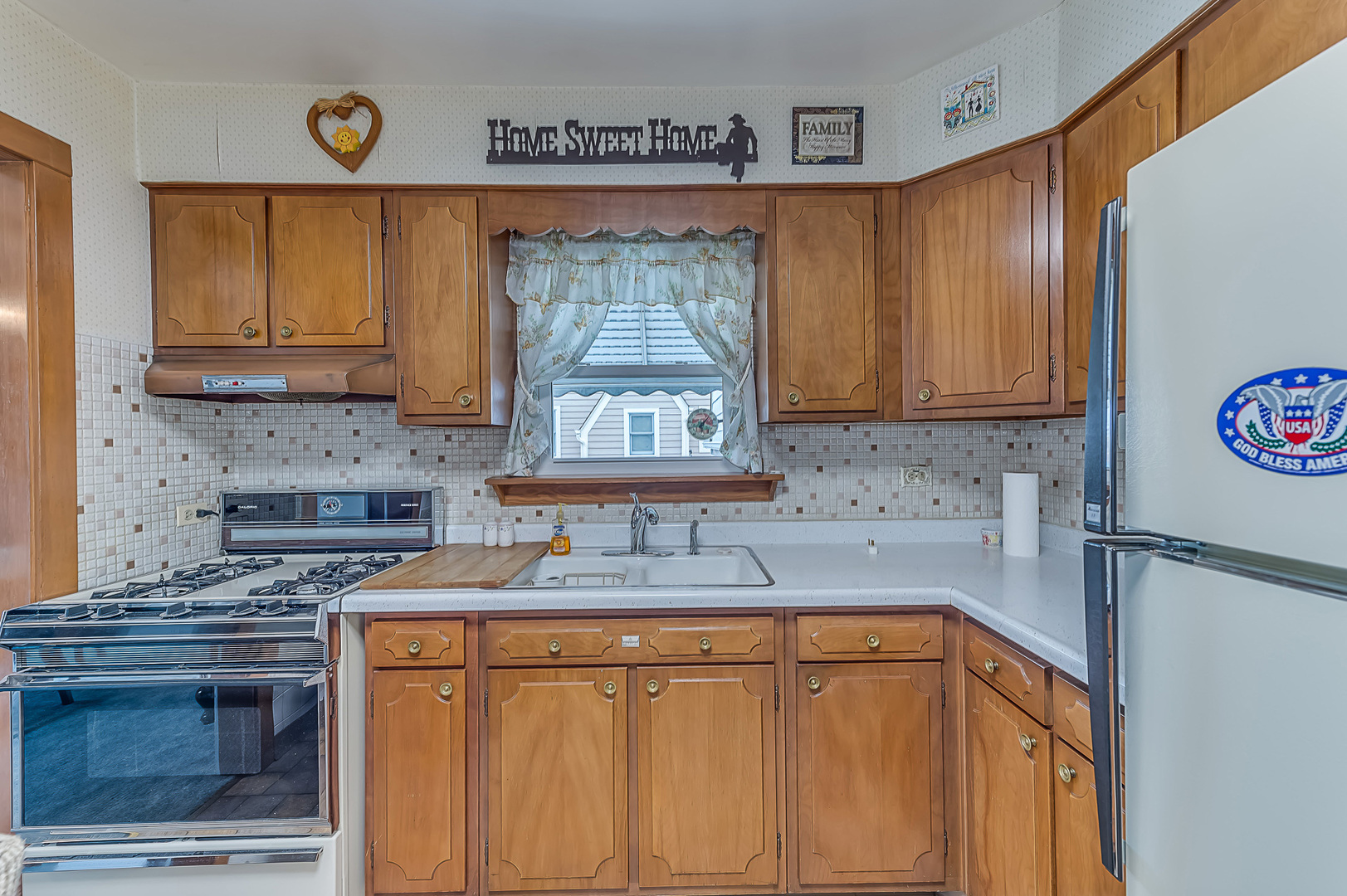 159 Parkview Drive Northlake, IL 60164 - Photo 10 of 24 a kitchen with stainless steel appliances granite countertop a sink stove and cabinets
