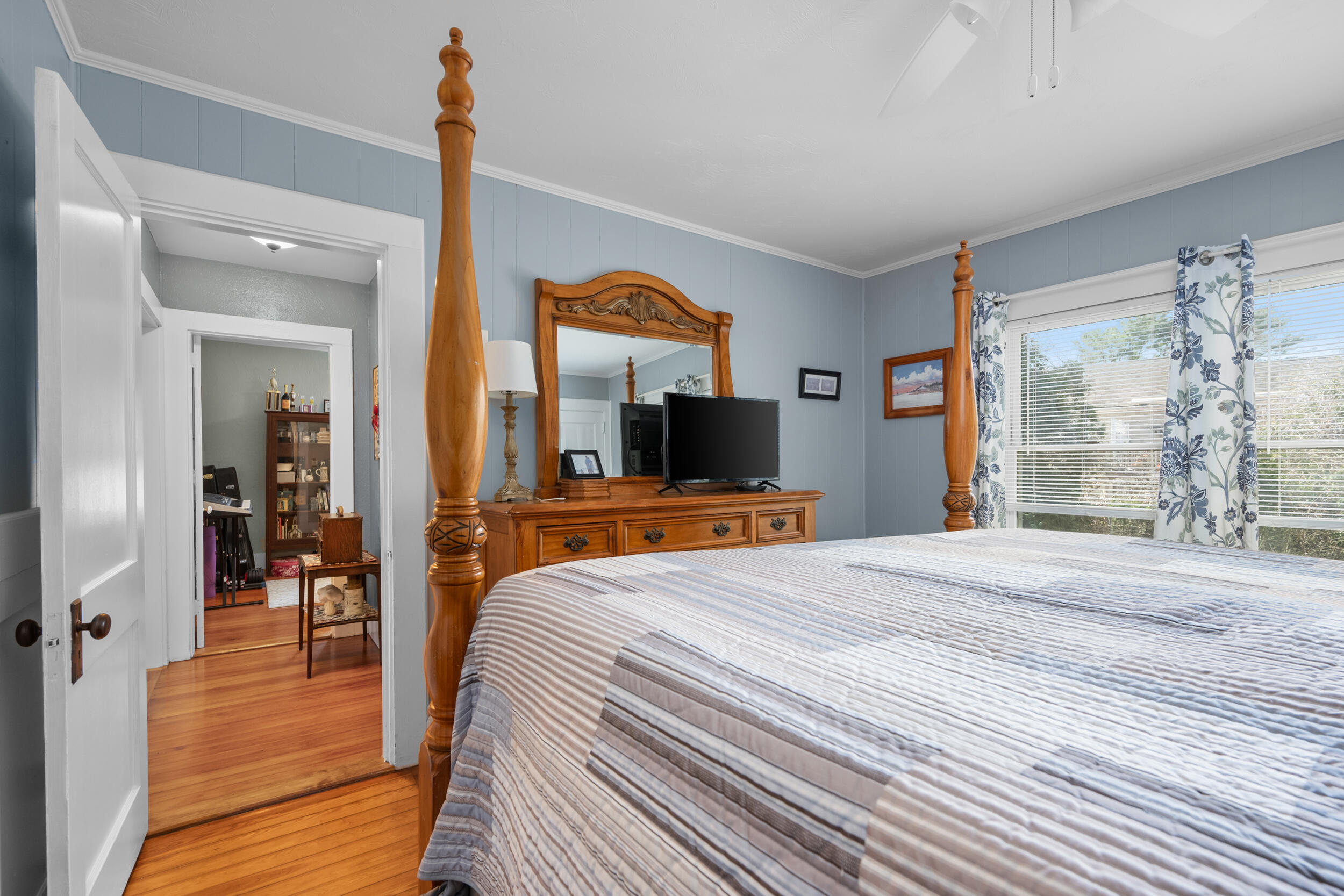 27 Head Of The Bay Road Buzzards Bay, MA 02532 - Photo 17 of 43 a bedroom with a bed and a flat tv screen on dresser