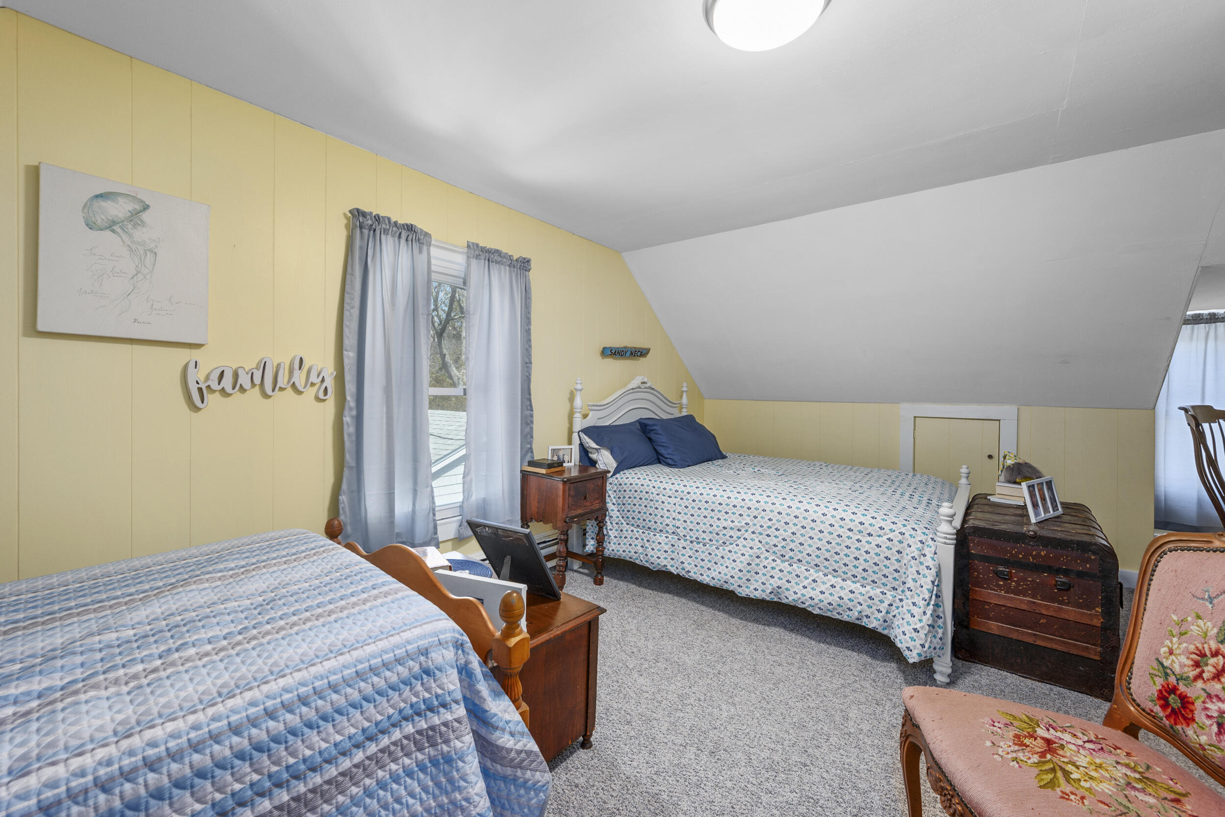 27 Head Of The Bay Road Buzzards Bay, MA 02532 - Photo 22 of 43 a bedroom with a bed and wooden floor