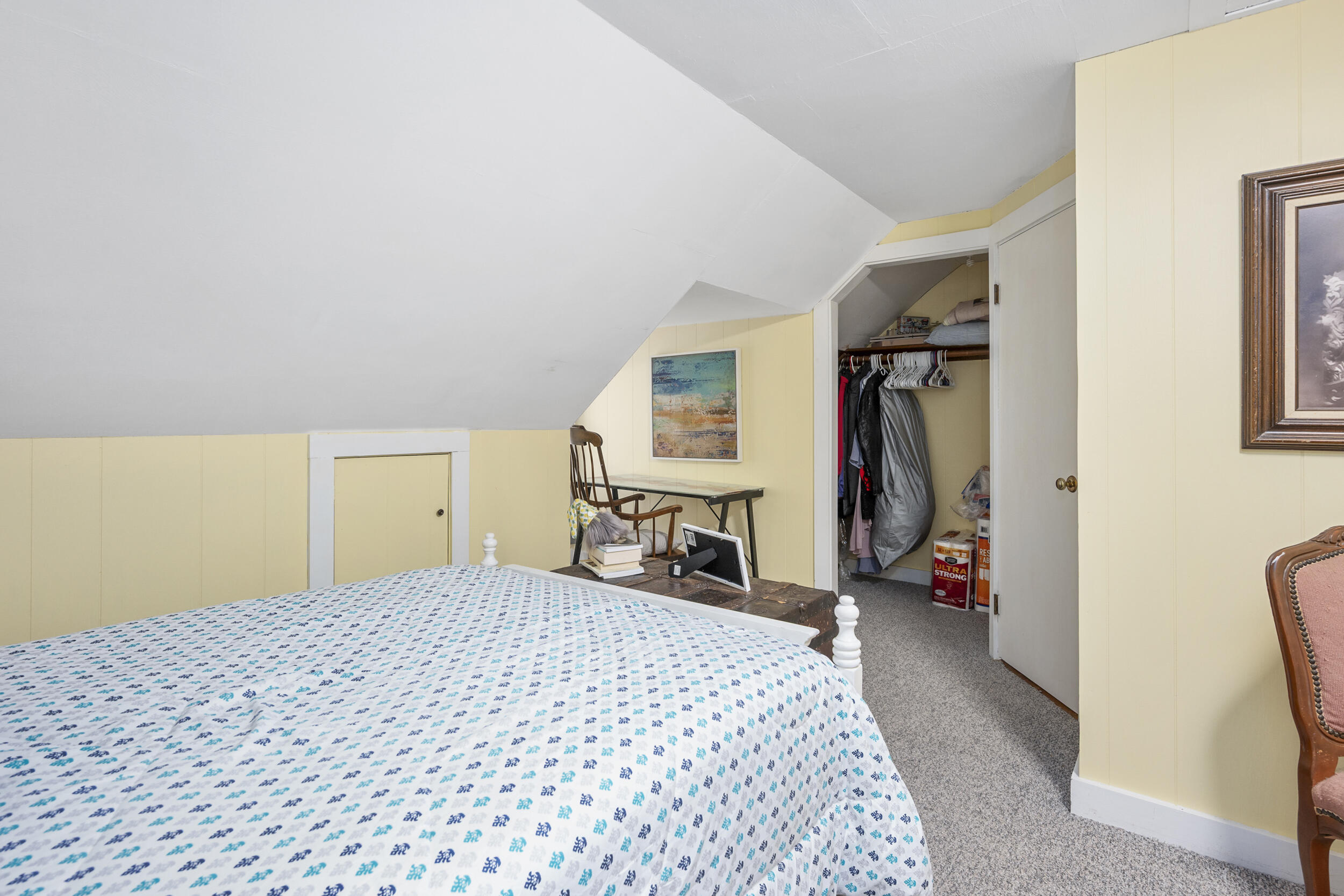 27 Head Of The Bay Road Buzzards Bay, MA 02532 - Photo 23 of 43 a bedroom with a bed and a lamp on dresser