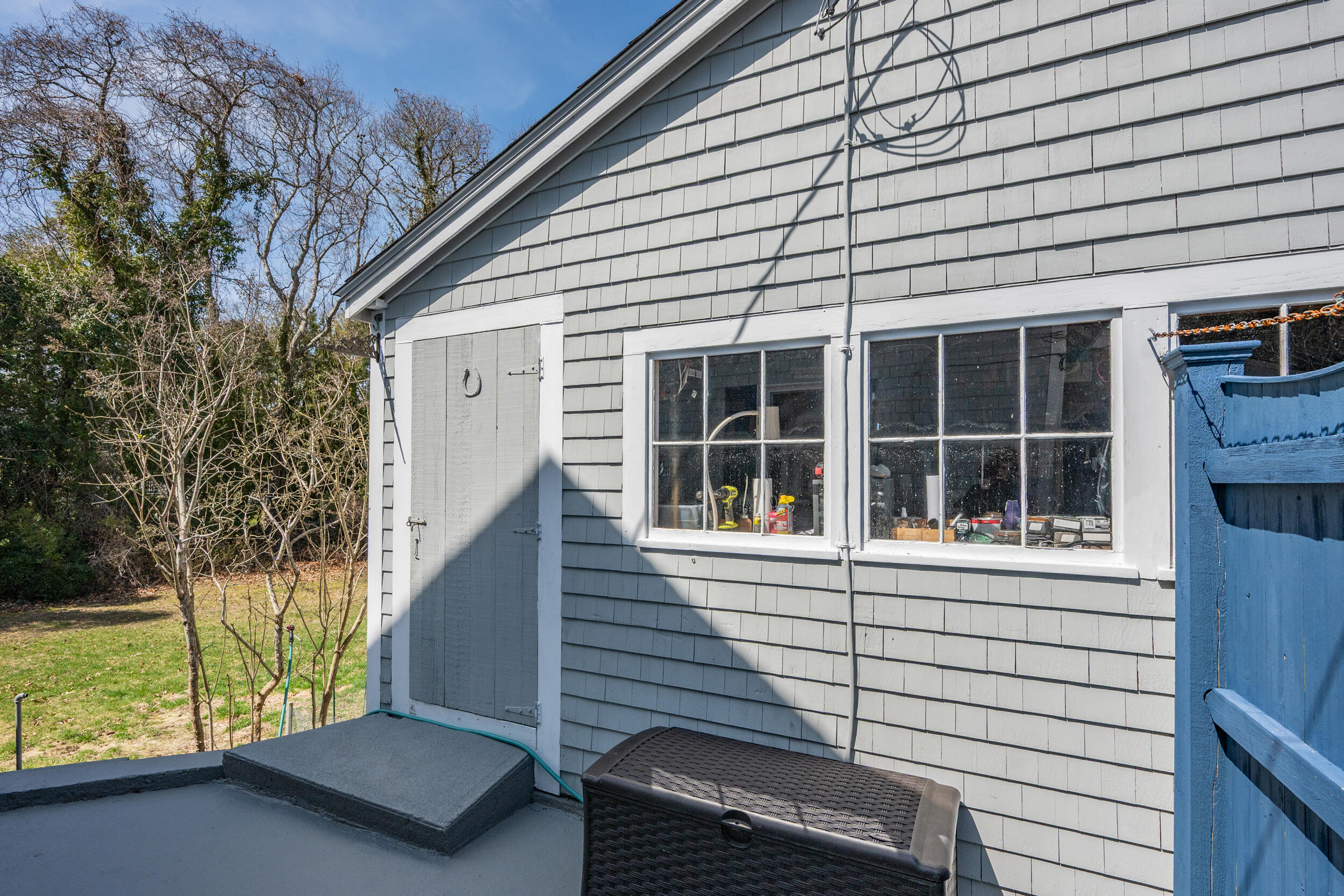 27 Head Of The Bay Road Buzzards Bay, MA 02532 - Photo 33 of 43 a view of a house with backyard and porch