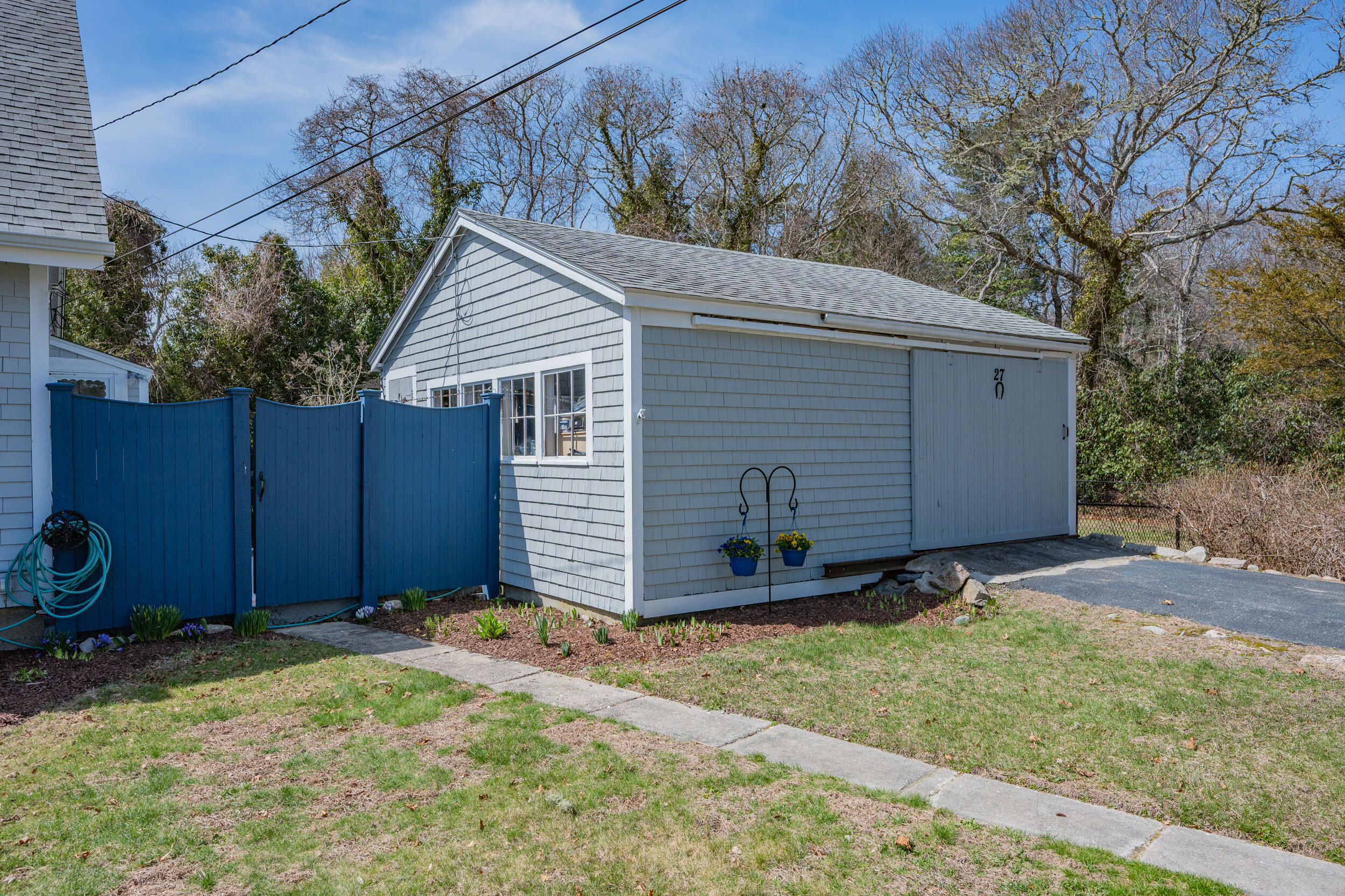 27 Head Of The Bay Road Buzzards Bay, MA 02532 - Photo 34 of 43 a house view with a backyard space