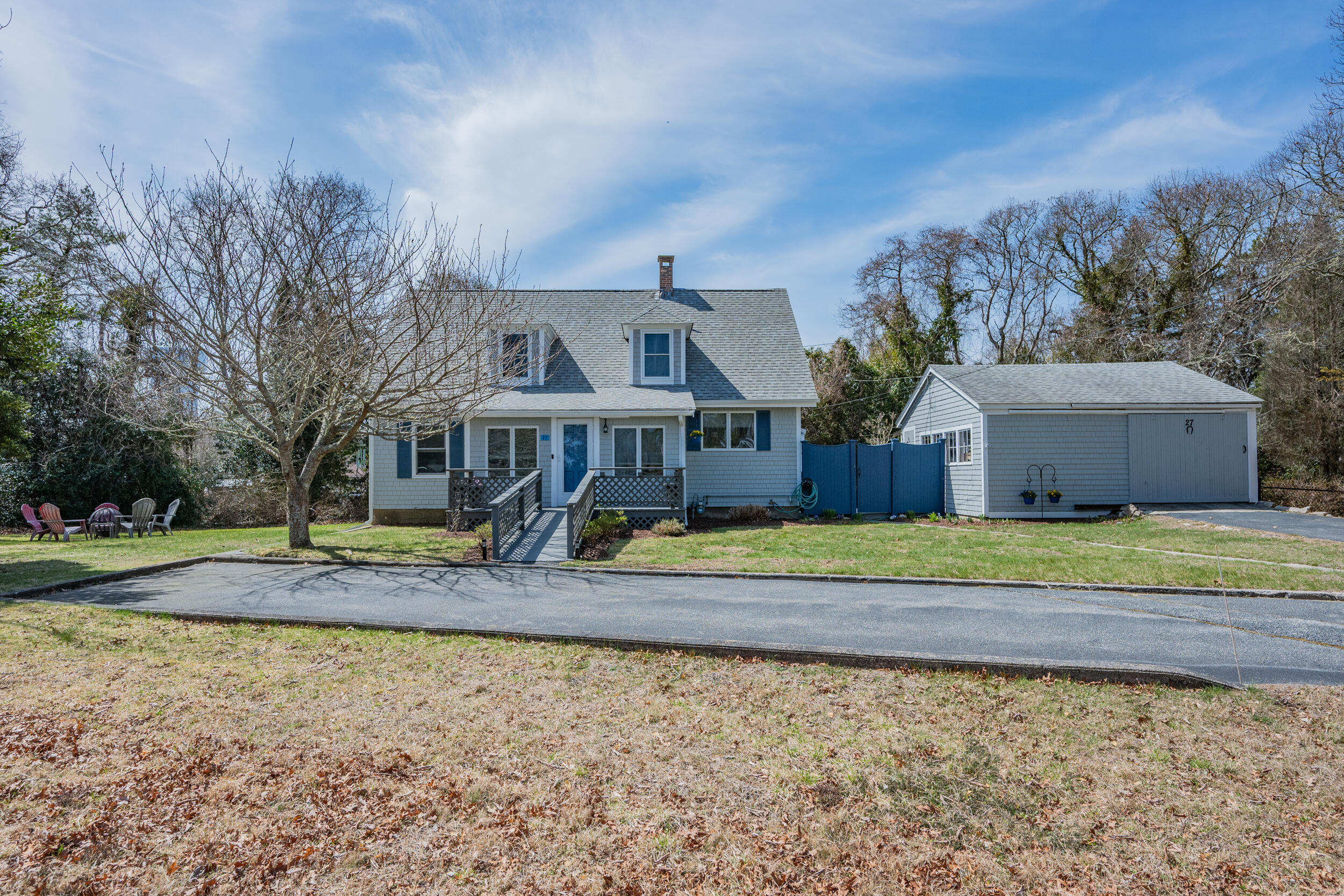 27 Head Of The Bay Road Buzzards Bay, MA 02532 - Photo 37 of 43 a view of a house with backyard and trees