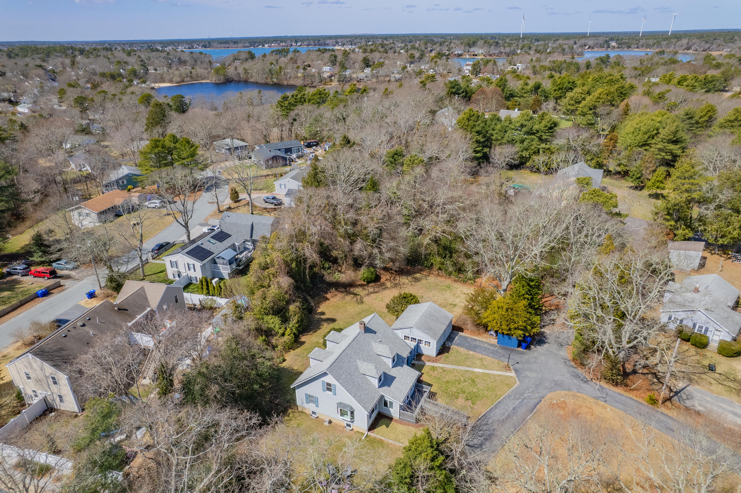 27 Head Of The Bay Road Buzzards Bay, MA 02532 - Photo 43 of 43 an aerial view of a house with a yard