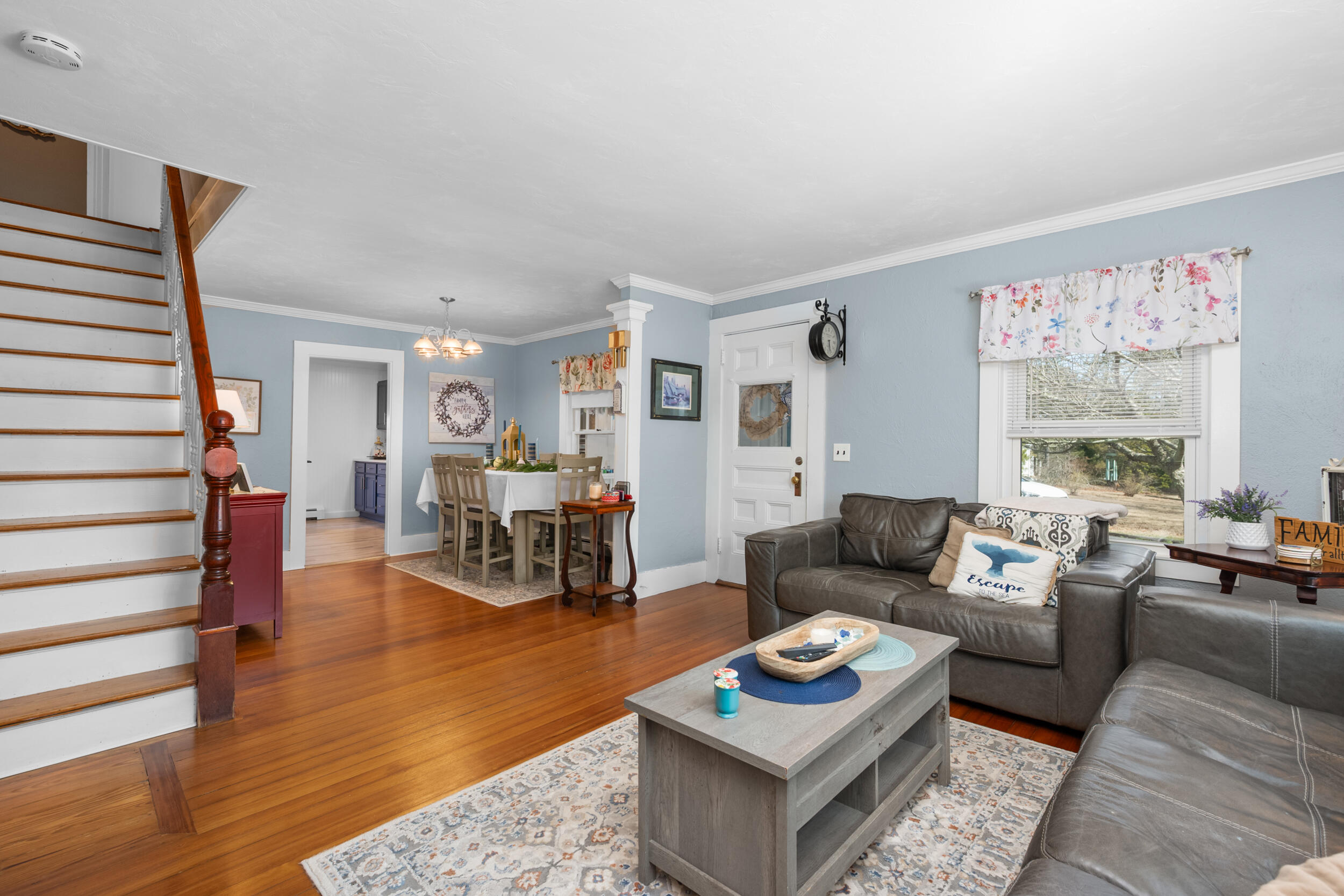 27 Head Of The Bay Road Buzzards Bay, MA 02532 - Photo 8 of 43 a living room with furniture and a table