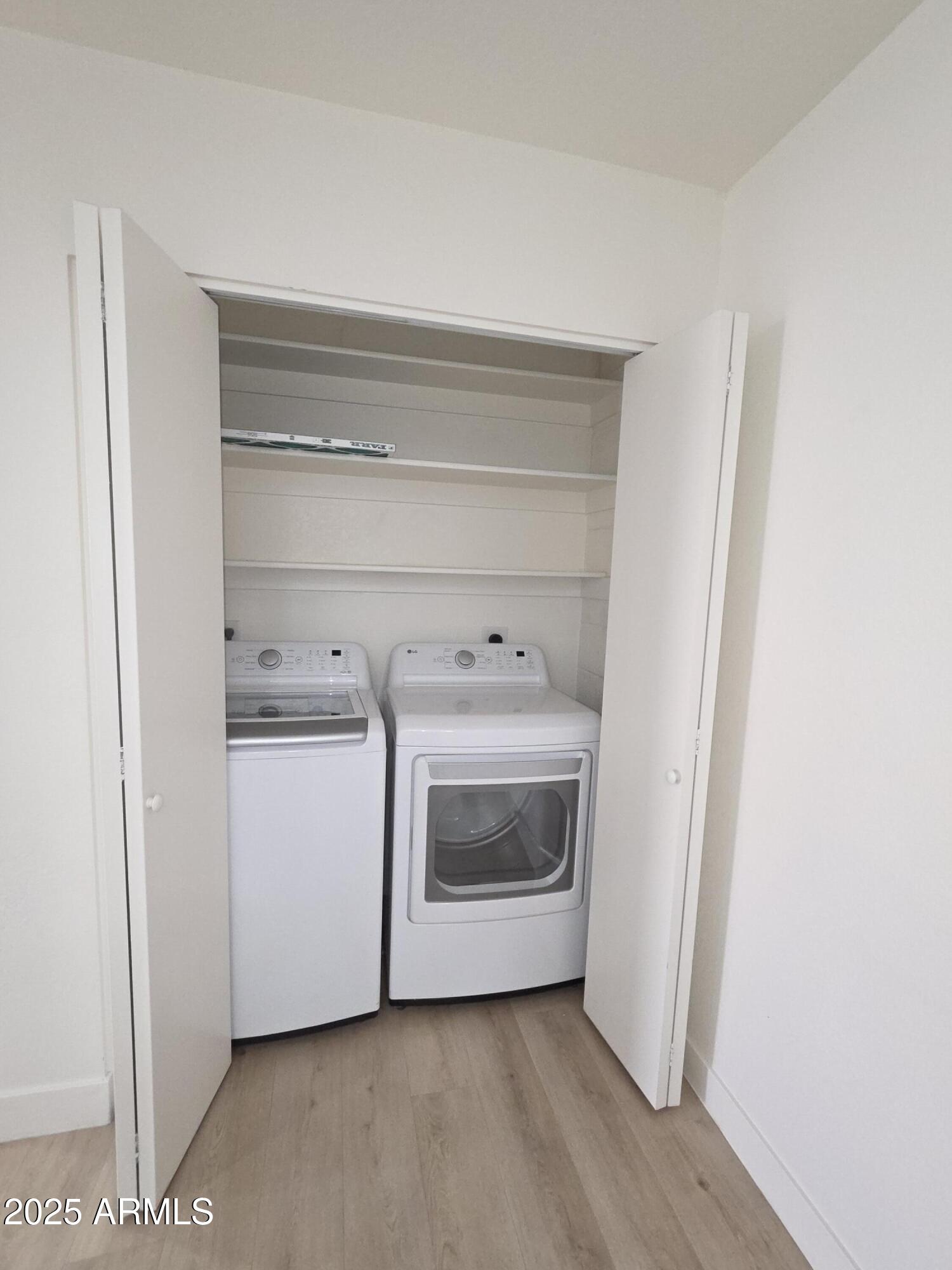 95 North Cooper Road, Unit 66 Chandler, AZ 85225 - Photo 15 of 25 a utility room with dryer and washer