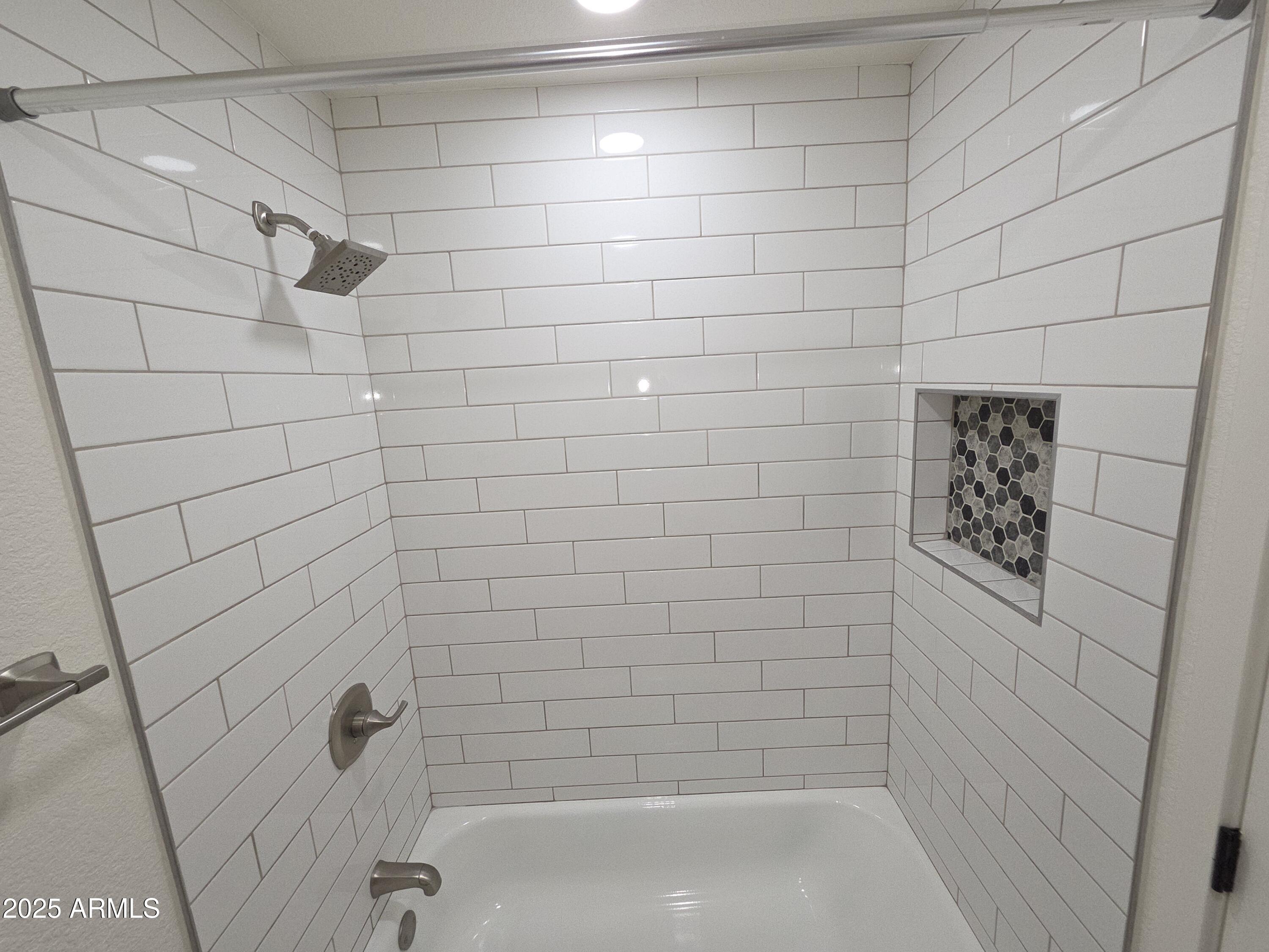 95 North Cooper Road, Unit 66 Chandler, AZ 85225 - Photo 16 of 25 a bathroom with a shower