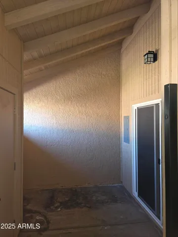 a view of a room with racks on the wall