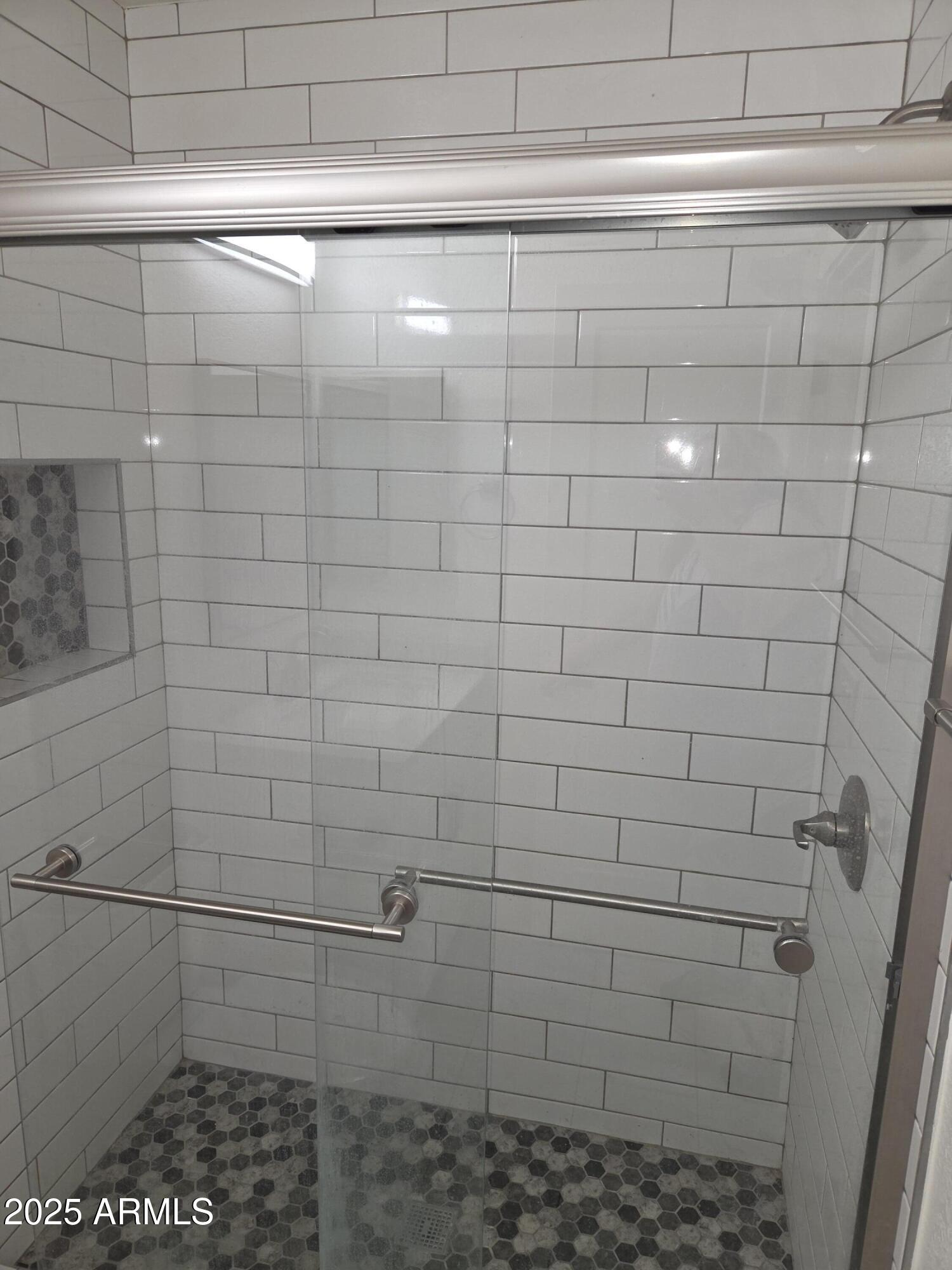 95 North Cooper Road, Unit 66 Chandler, AZ 85225 - Photo 10 of 25 a bathroom with a shower