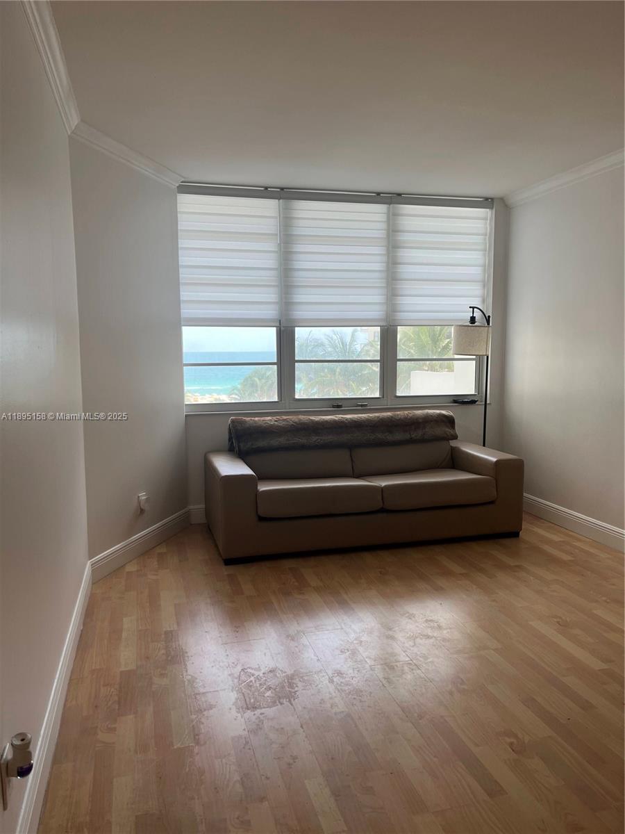 Miami Beach City Center Miami Beach, FL 33139 - Photo 11 of 15 a view of a room with furniture and a window