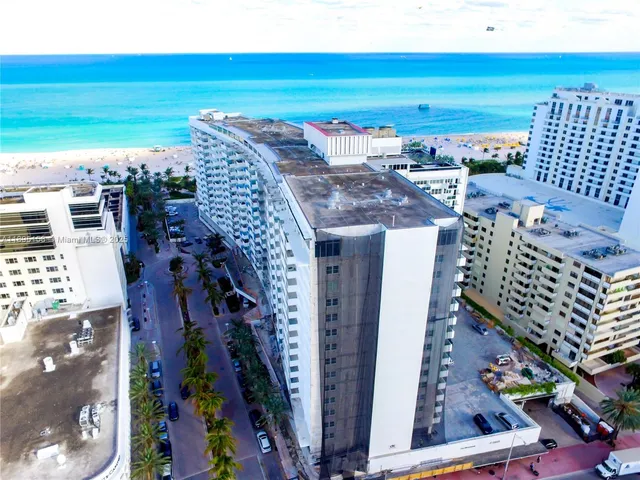 a view of a city with an ocean view