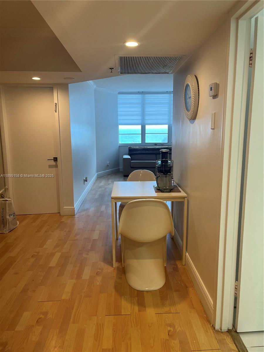 Miami Beach City Center Miami Beach, FL 33139 - Photo 8 of 15 a room that has a toilet and a window in it