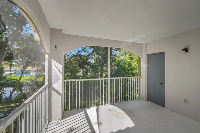 a living room with furniture flat screen tv and a fireplace