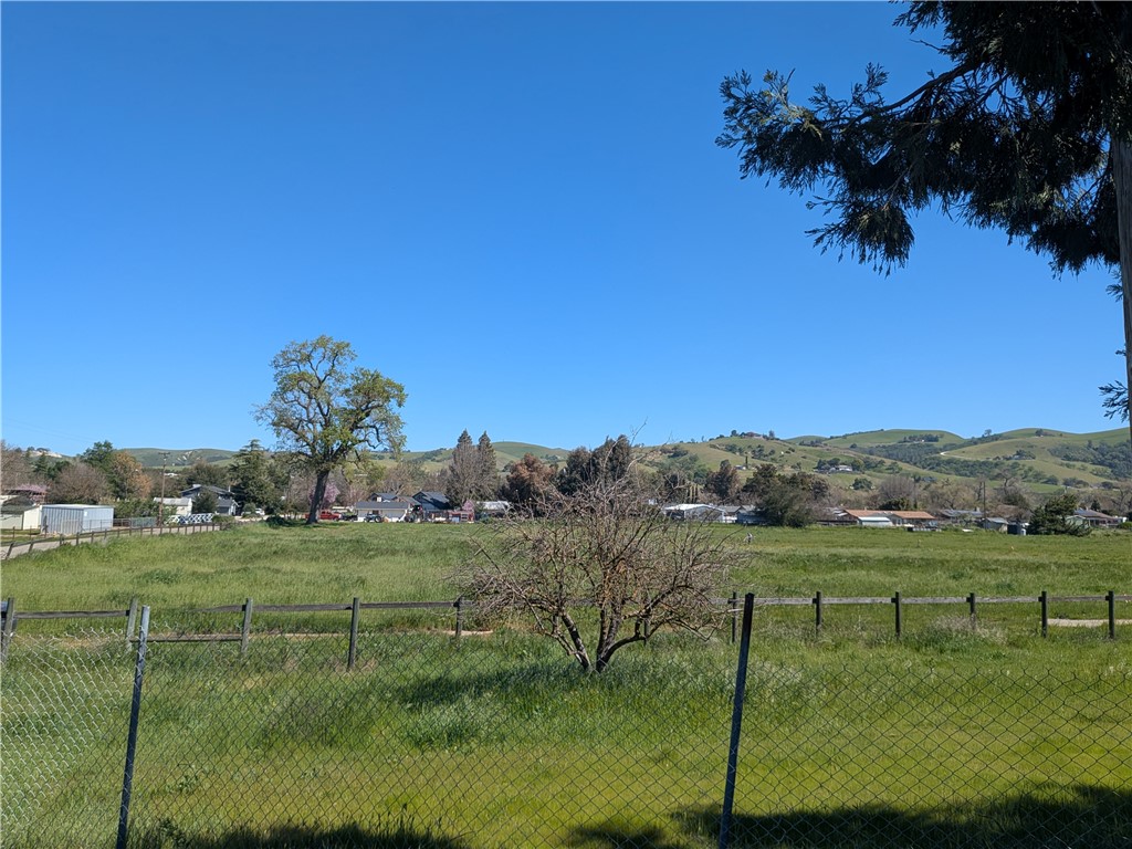 7725 Gabarda Road Atascadero, CA 93422 - Photo 3 of 6 a view of a lake with a mountain in the background