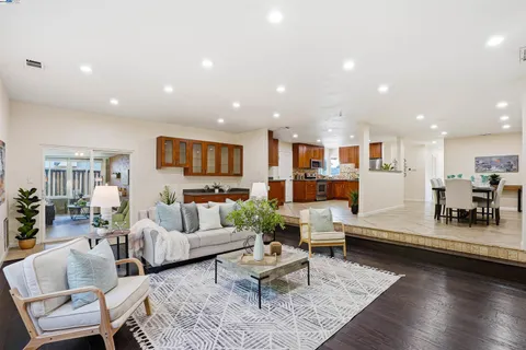 a living room with furniture and a table