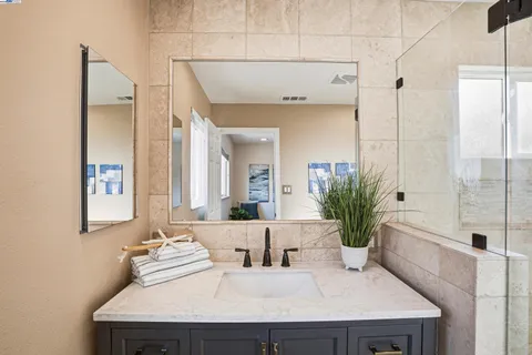 a dining room with table and chairs