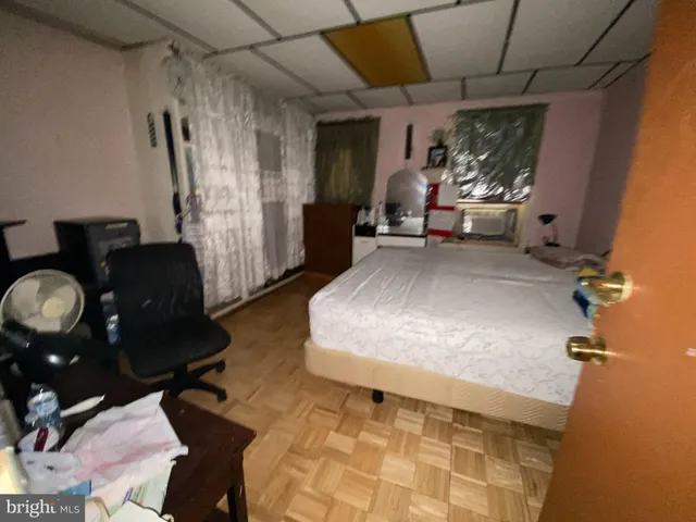 a kitchen with a table and chairs in it