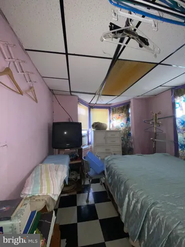 a bathroom with a toilet and a sink