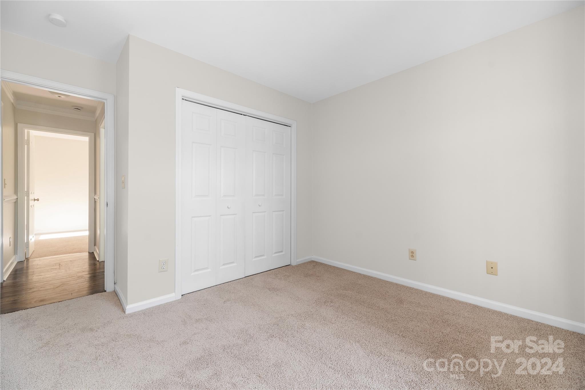 107 Planters Row Road Iron Station, NC 28080 - Photo 21 of 37 an empty room with a bench