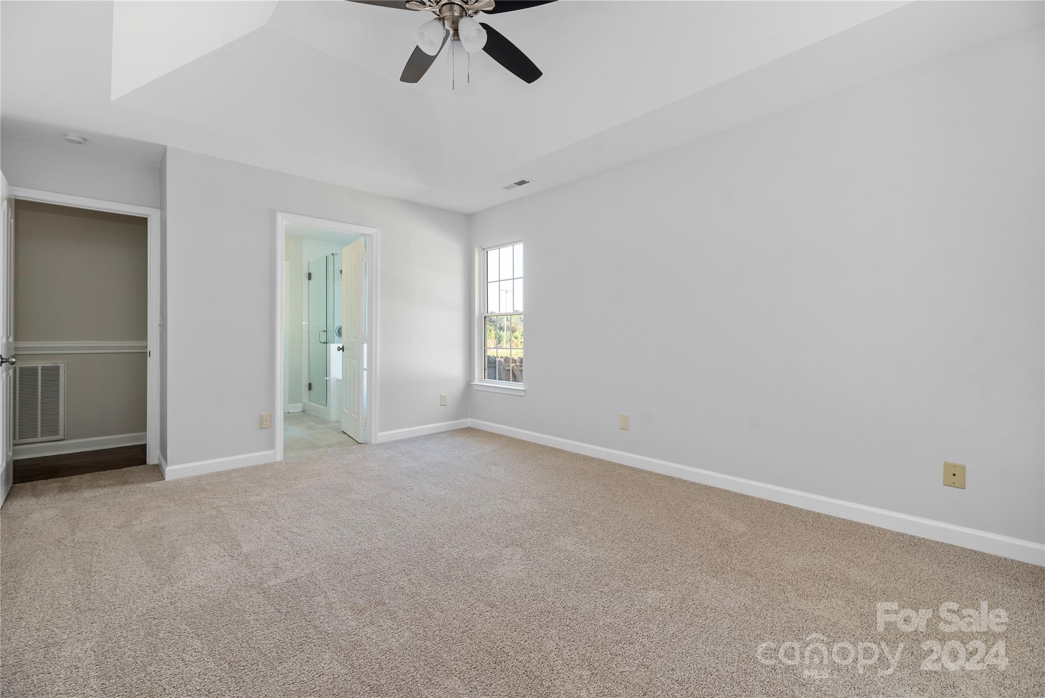 107 Planters Row Road Iron Station, NC 28080 - Photo 25 of 37 a view of an empty room with a window