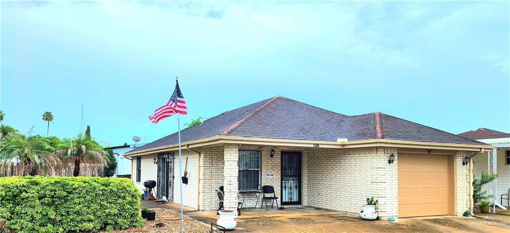 a front view of a house with yard