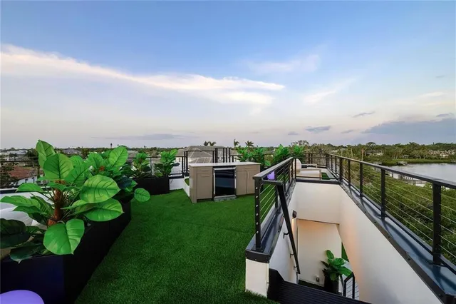 a living room with furniture and a mirror