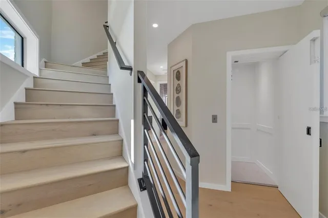 a kitchen with stainless steel appliances granite countertop a stove and a refrigerator