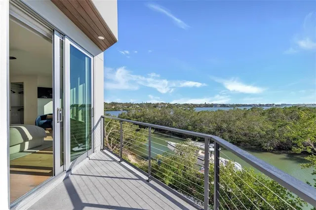 a bathroom with a double vanity sink tub and mirror