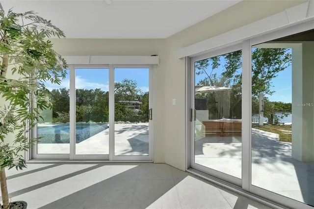 a backyard of a house with outdoor seating