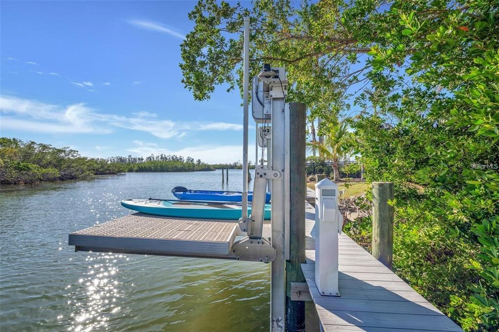 1406 Tangier Way Sarasota, FL 34239 - Photo 57 of 58 a view of a lake from a balcony with outdoor space