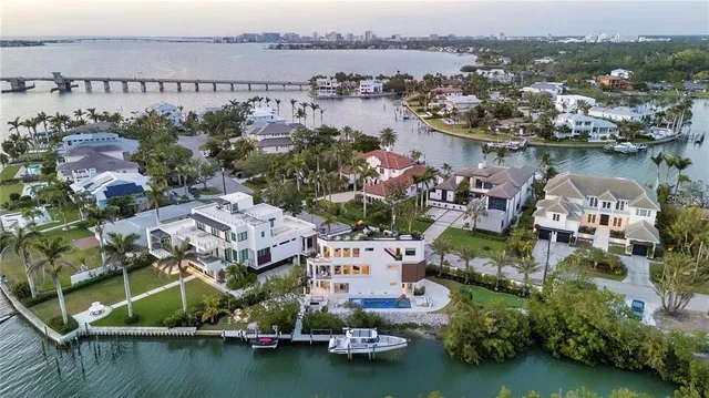 an aerial view of a city with lake view