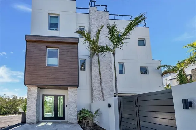 a plant that is in front of a house