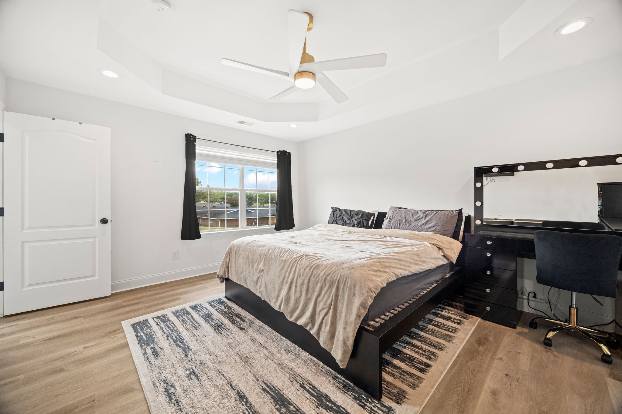 420 Larkin Springs Road Madison, TN 37115 - Photo 13 of 30 a bedroom with a large bed and a window