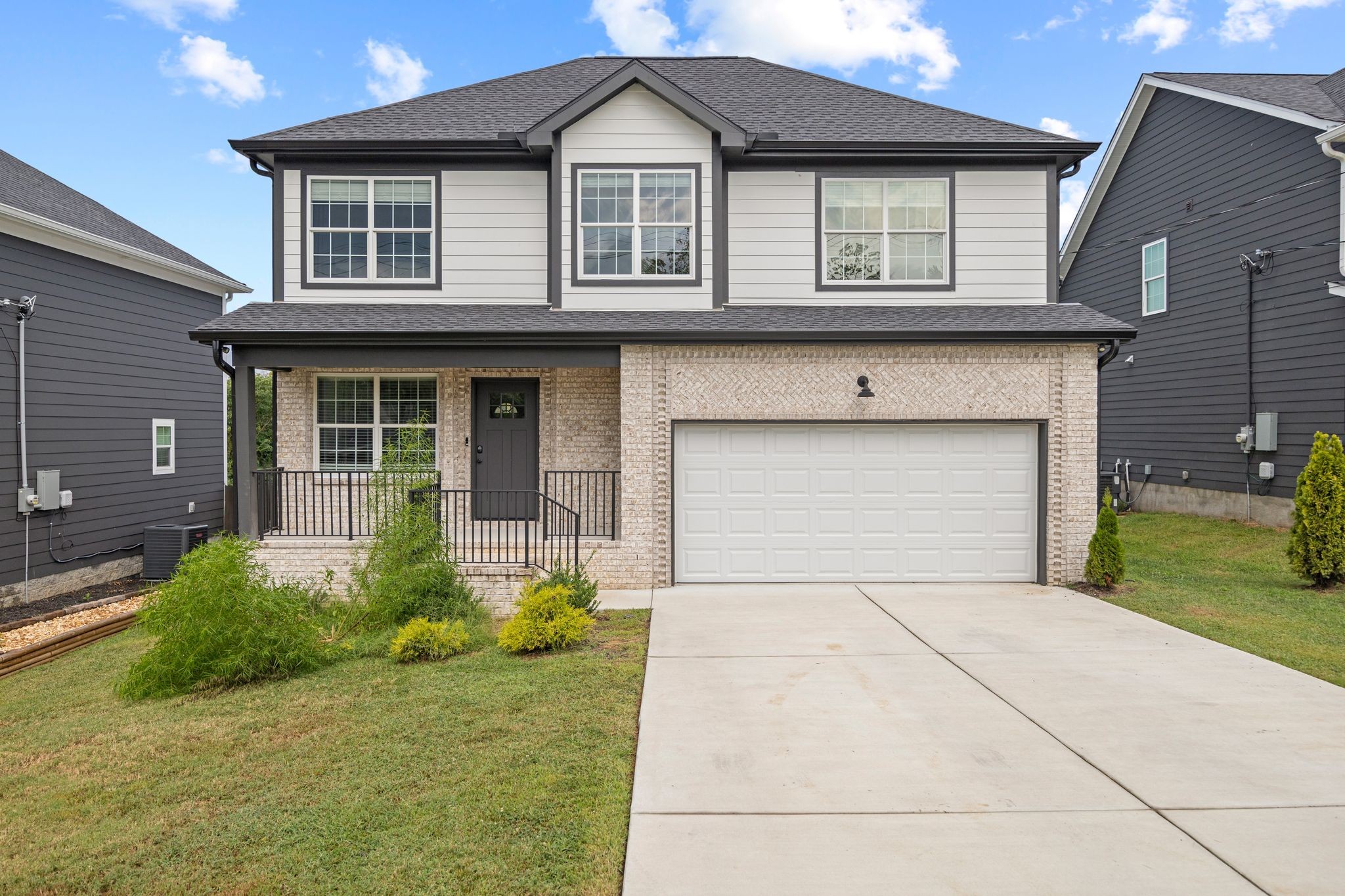 420 Larkin Springs Road Madison, TN 37115 - Photo 2 of 30 a front view of a house with garden