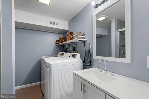 a utility room with dryer and washer