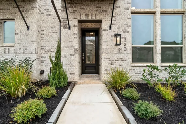 a entryway with flower pots