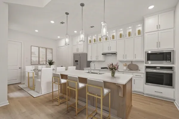 a large kitchen with lots of counter space and appliances