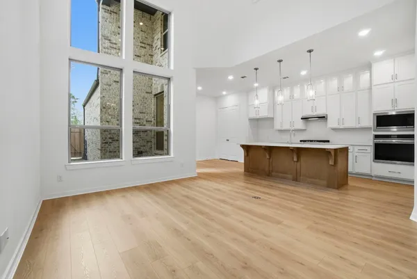 a view of kitchen and kitchen with sink