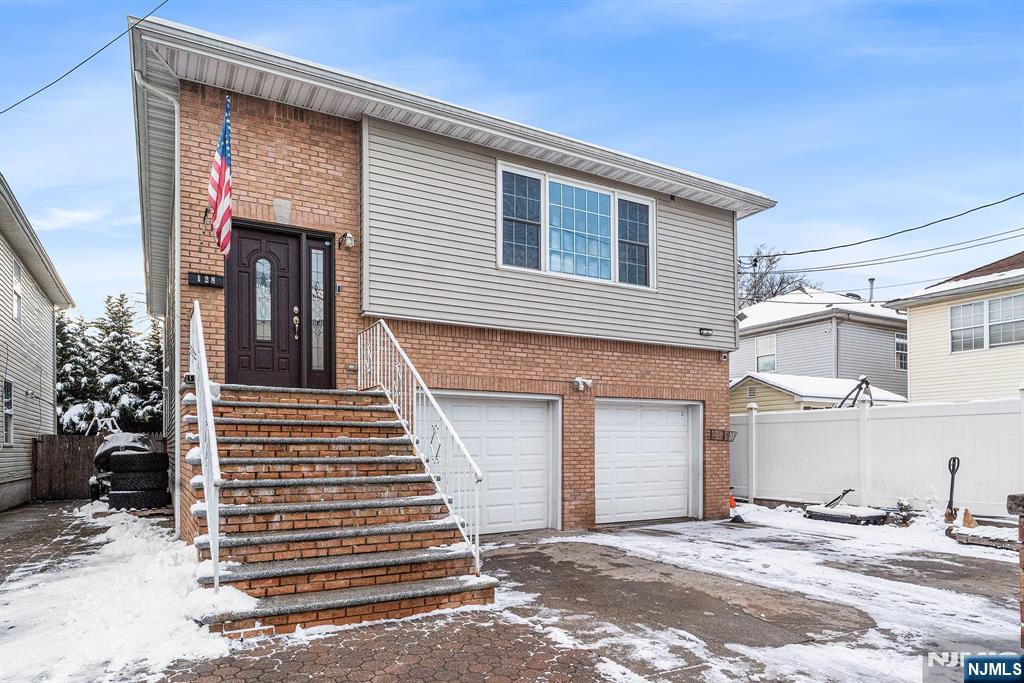 128 Baltimore Avenue Hillside, NJ 07205 - Photo 2 of 50 a front view of a house