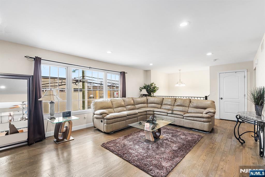 128 Baltimore Avenue Hillside, NJ 07205 - Photo 4 of 50 a living room with furniture and a large window