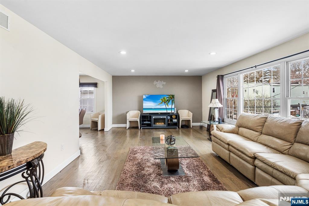 128 Baltimore Avenue Hillside, NJ 07205 - Photo 6 of 50 a living room with furniture and a large window