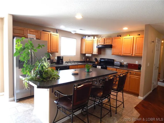 $389,000 | 96 Skylark Lane, Linn Creek, MO 65052