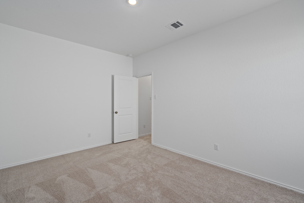 230 Gabbro Gardens Maxwell, TX 78656 - Photo 17 of 24 a view of an empty room